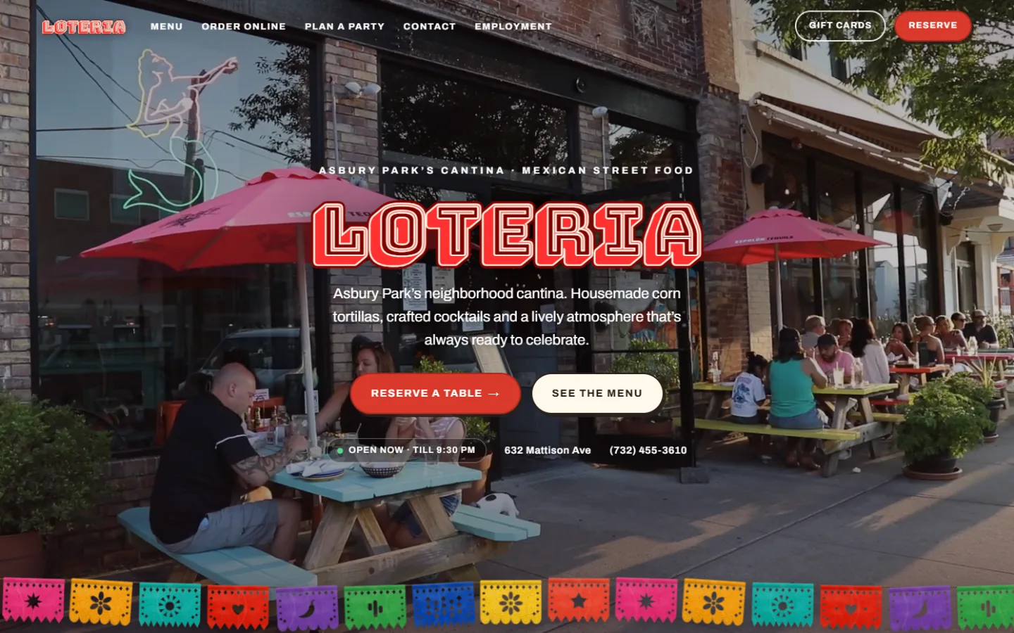 Lotería's website today: a full-bleed photograph of the cantina with the Lotería logotype over it.
